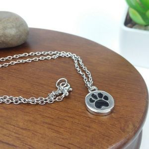Dog paw charm silver tone chain necklace.